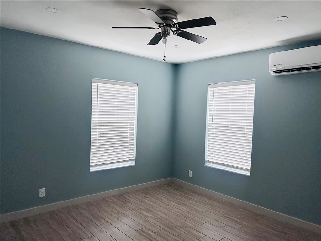 516 East 6th Street, Unit A Alice, TX 78332 - Photo 11 of 16 a view of a room that has a window in it