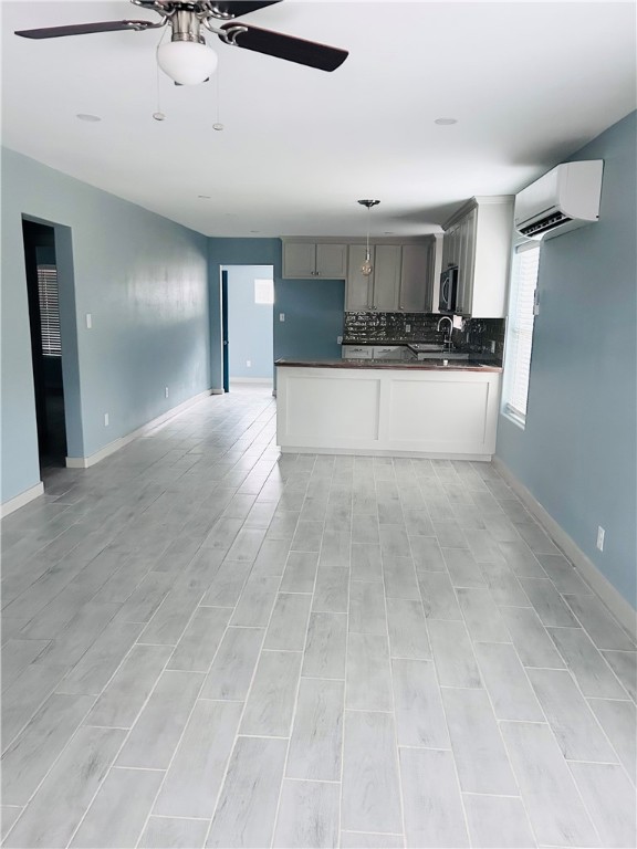 516 East 6th Street, Unit A Alice, TX 78332 - Photo 2 of 16 a view of kitchen with refrigerator and window
