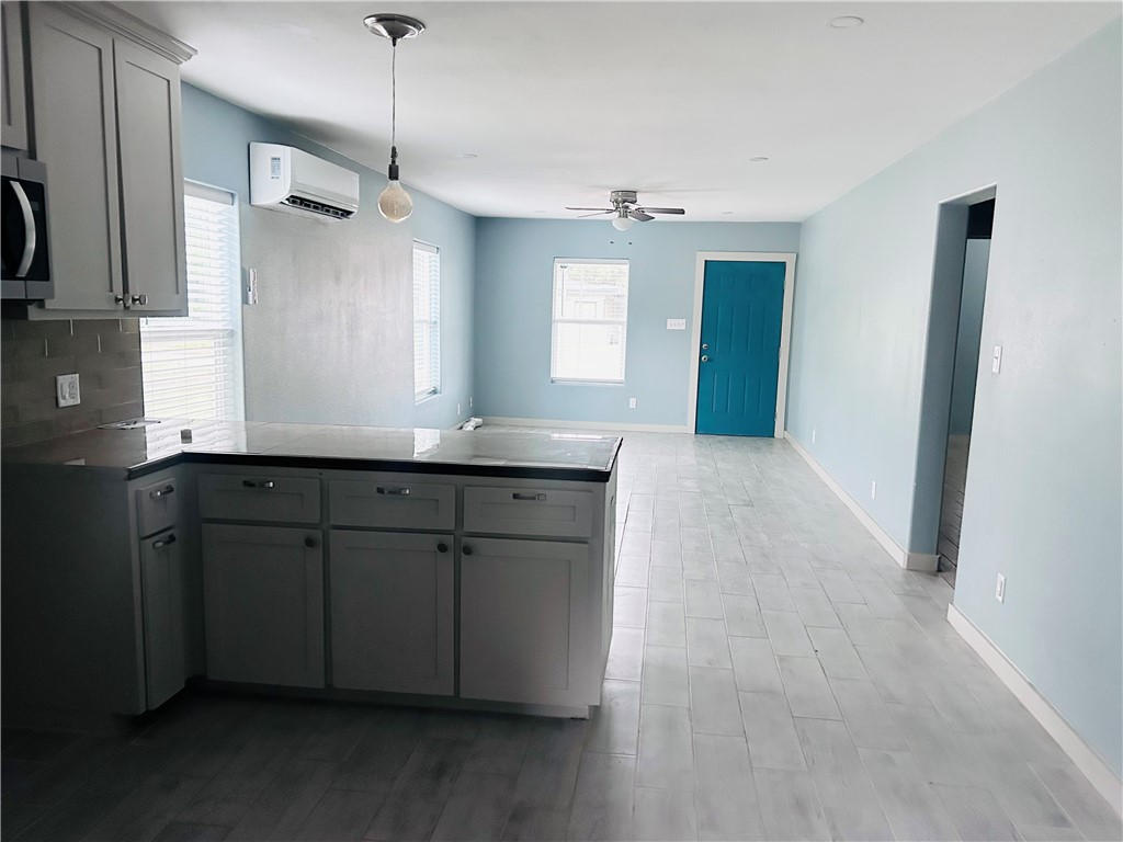 516 East 6th Street, Unit A Alice, TX 78332 - Photo 6 of 16 a bathroom with a sink and a mirror