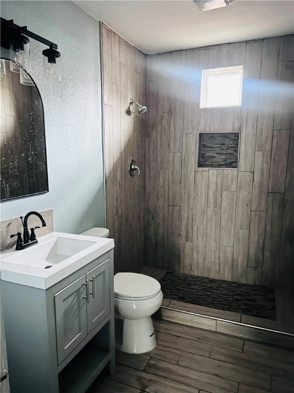 516 East 6th Street, Unit A Alice, TX 78332 - Photo 10 of 16 a bathroom with a sink a toilet and shower