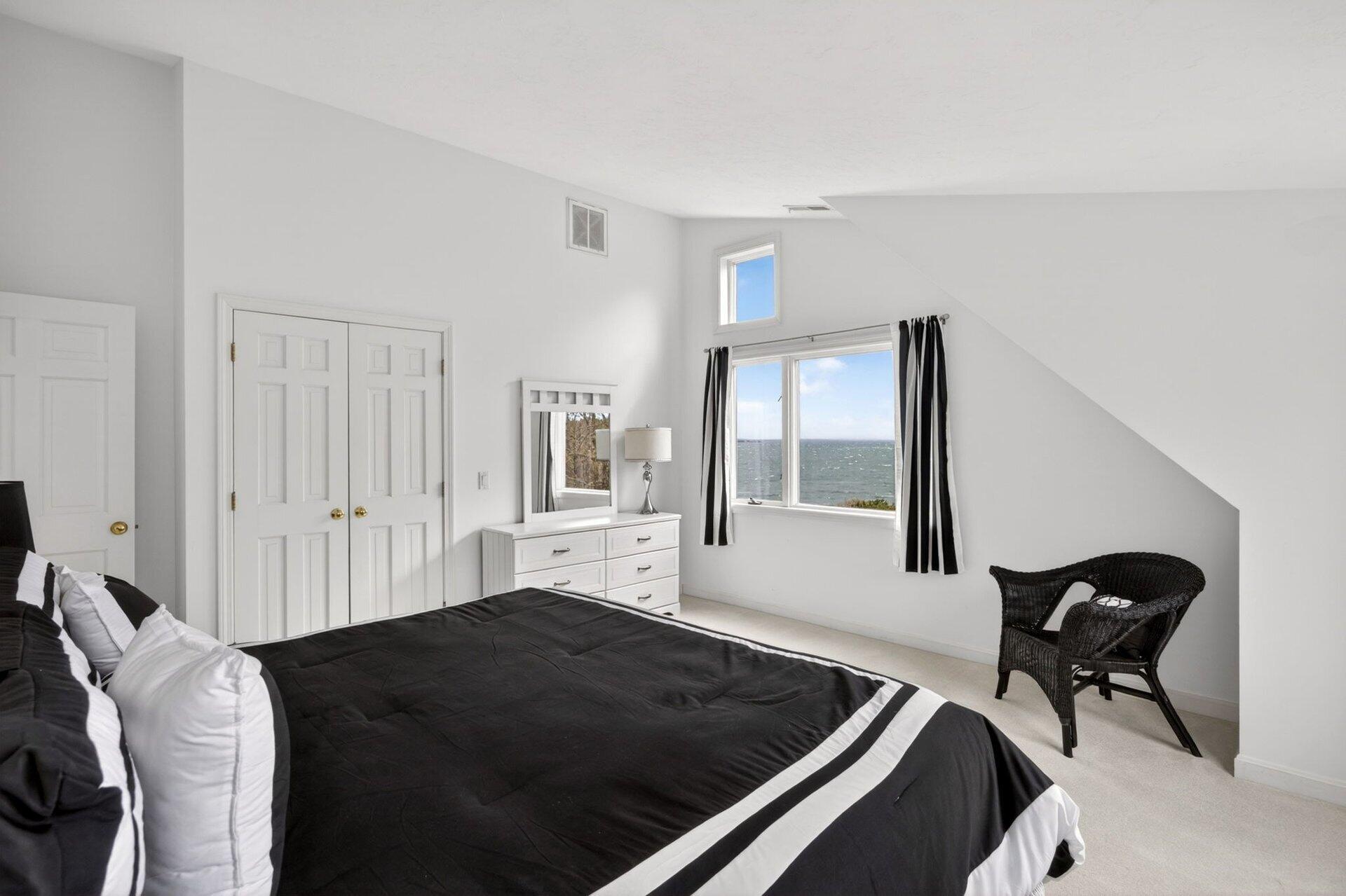 461 Wings Neck Road Pocasset, MA 02559 - Photo 26 of 42 a living room with furniture and a window