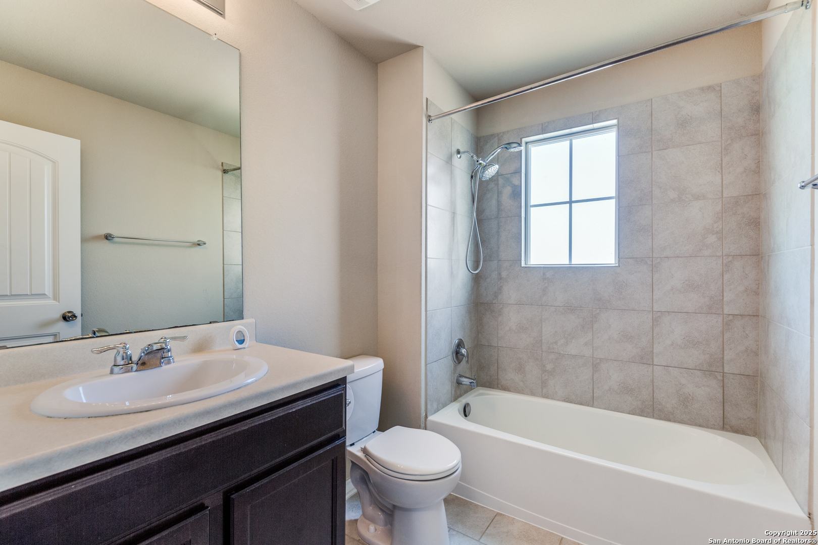 7522 Rigel Chase San Antonio, TX 78252 - Photo 13 of 19 a bathroom with a sink a toilet and a bathtub