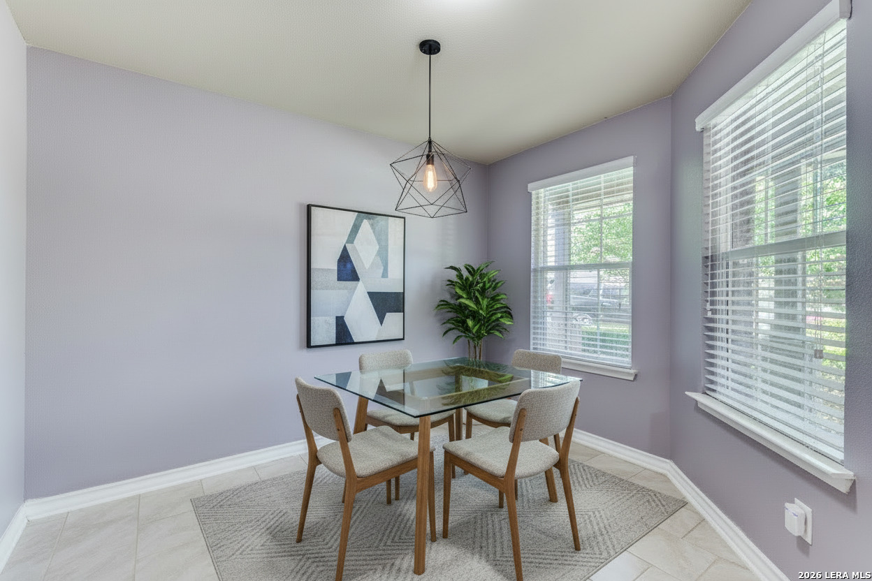 7522 Rigel Chase San Antonio, TX 78252 - Photo 6 of 19 a dining room with furniture and window