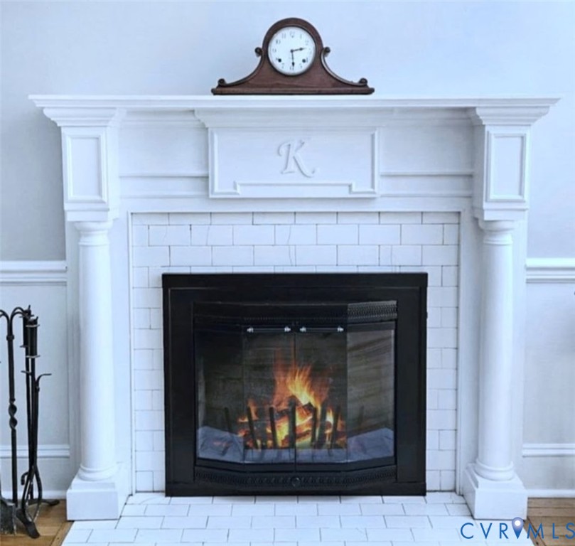 2800 Nottoway Boulevard Victoria, VA 23974 - Photo 14 of 50 a fireplace with a clock on wall