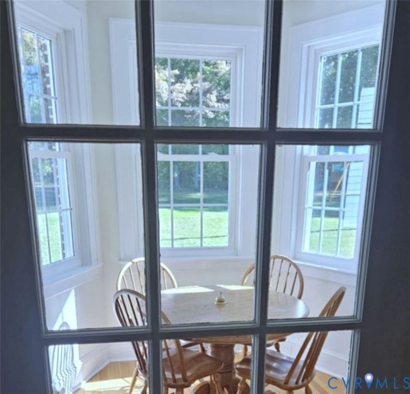 2800 Nottoway Boulevard Victoria, VA 23974 - Photo 21 of 50 a view of a dining room with furniture large windows and wooden floor