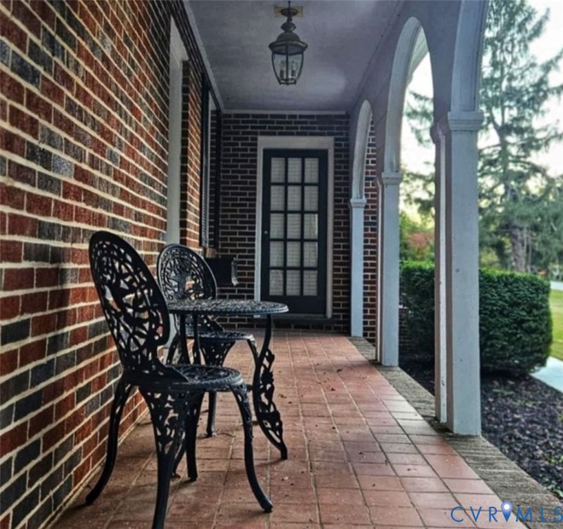 2800 Nottoway Boulevard Victoria, VA 23974 - Photo 36 of 50 a view of a dinning table and chairs in patio of a house