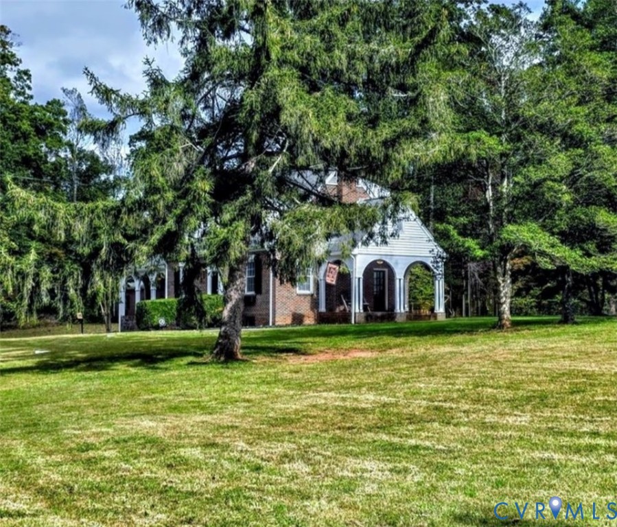 2800 Nottoway Boulevard Victoria, VA 23974 - Photo 40 of 50 a front view of a house with a yard
