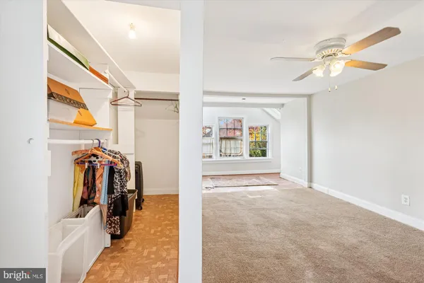 a view of a livingroom with a ceiling fan