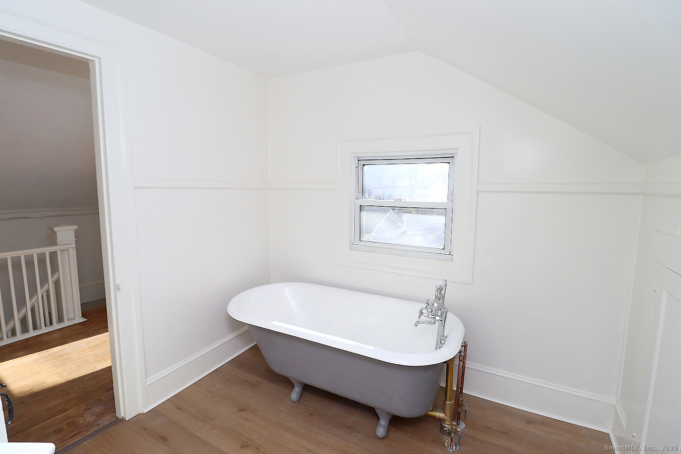 9 John Street Winchester, CT 06098 - Photo 21 of 23 a bathroom with a bathtub and a window