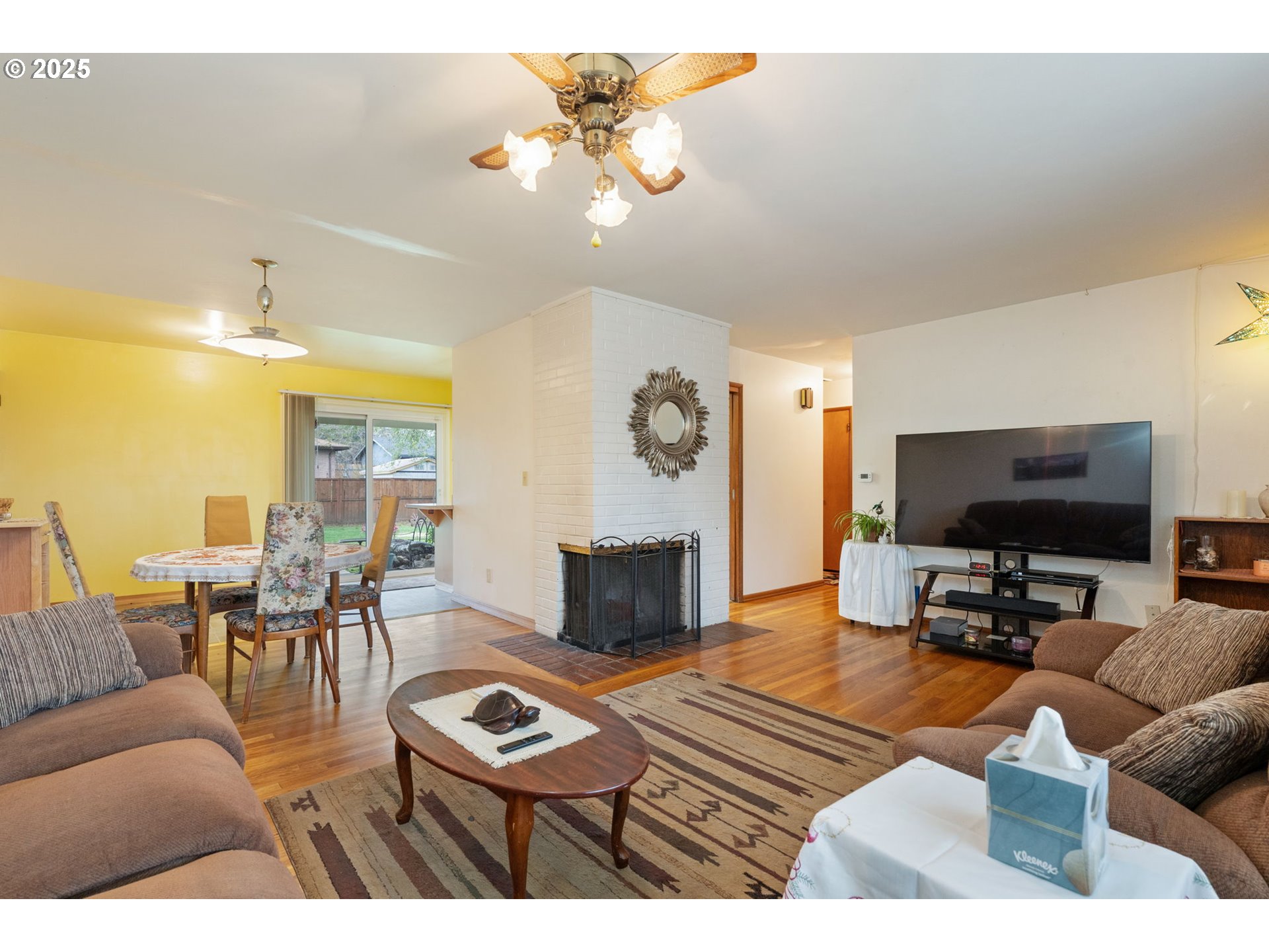 2707 Northeast 123rd Avenue Portland, OR 97230 - Photo 4 of 25 a living room with furniture and a flat screen tv