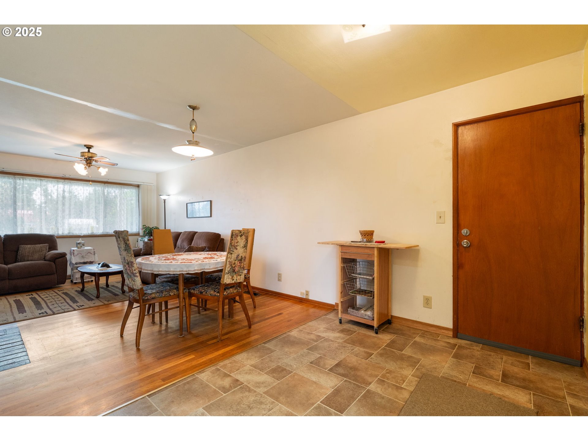 2707 Northeast 123rd Avenue Portland, OR 97230 - Photo 8 of 25 a dining room with furniture and wooden floor