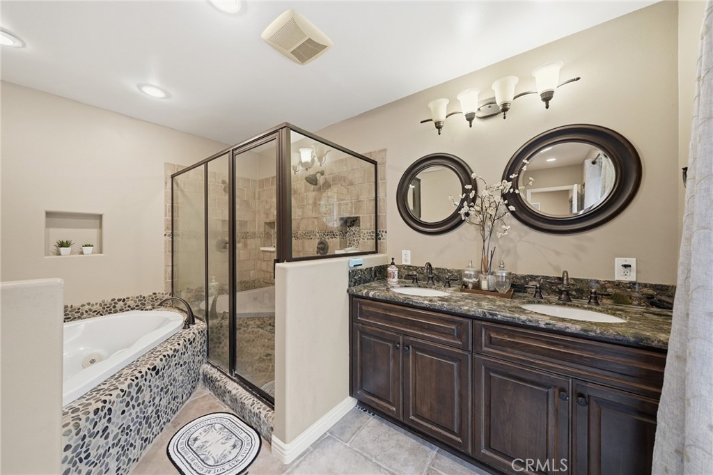 706 Nancy Lane Fullerton, CA 92831 - Photo 12 of 56 a bathroom with a granite countertop sink and a mirror