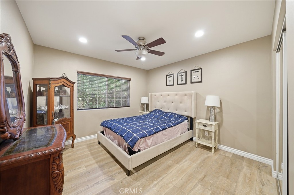706 Nancy Lane Fullerton, CA 92831 - Photo 18 of 56 a living room with a bed furniture and a large window