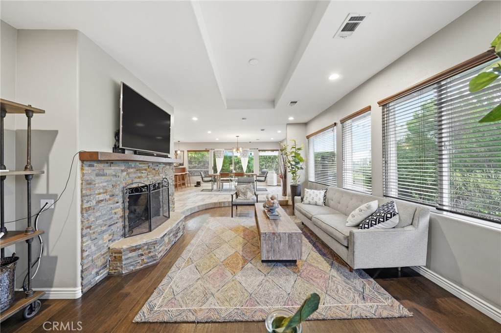 706 Nancy Lane Fullerton, CA 92831 - Photo 24 of 56 a living room with furniture fireplace and flat screen tv