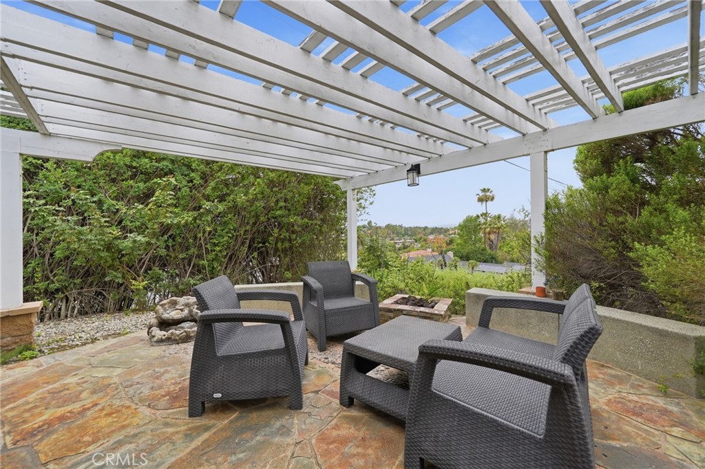 706 Nancy Lane Fullerton, CA 92831 - Photo 37 of 56 a outdoor living space with furniture and garden view