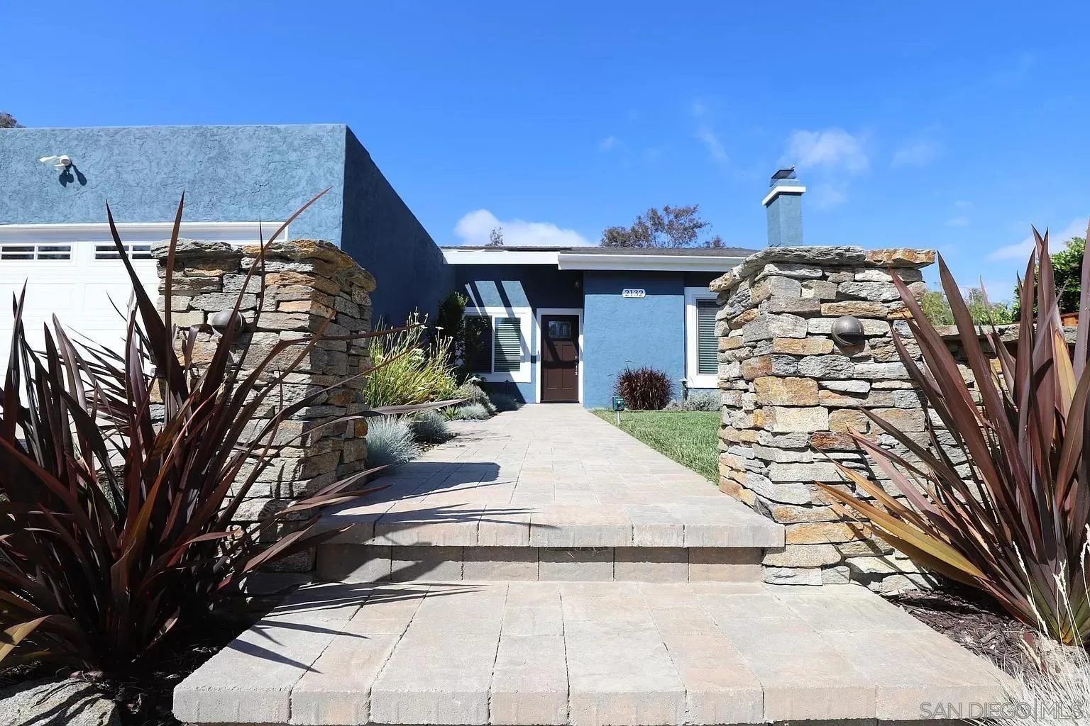 2132 Pleasant Grove Road Encinitas, CA 92024 - Photo 2 of 21 a car parked in front of a building