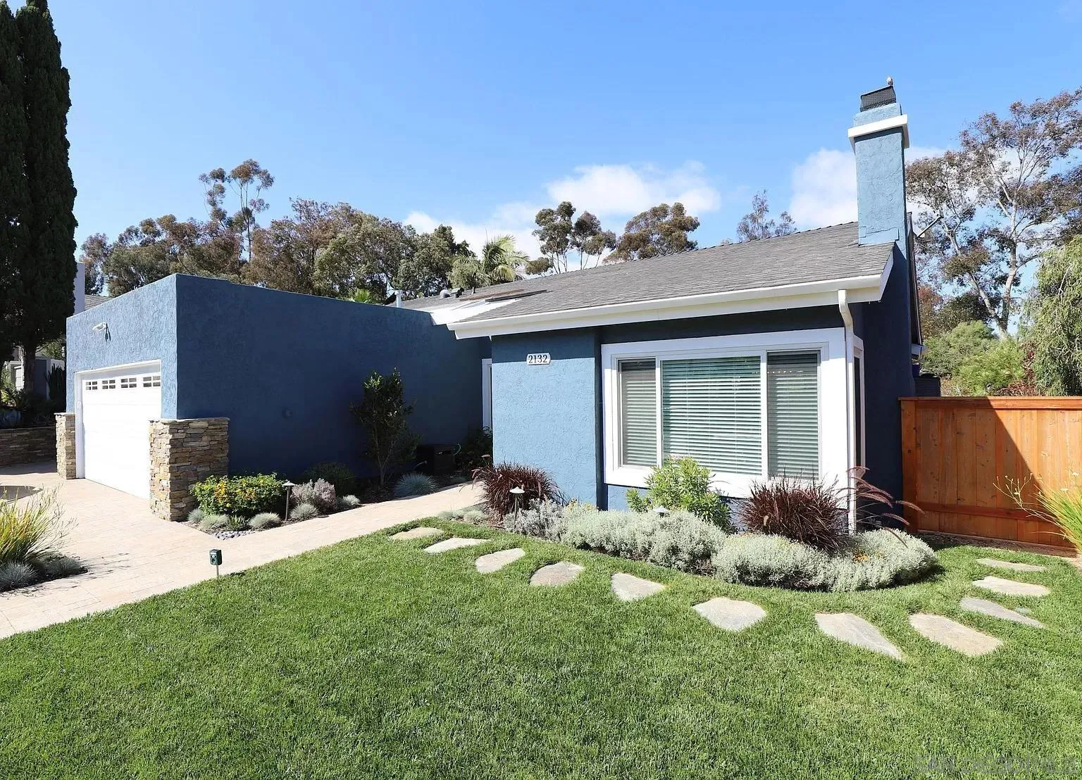 2132 Pleasant Grove Road Encinitas, CA 92024 - Photo 3 of 21 front view of a house with a yard