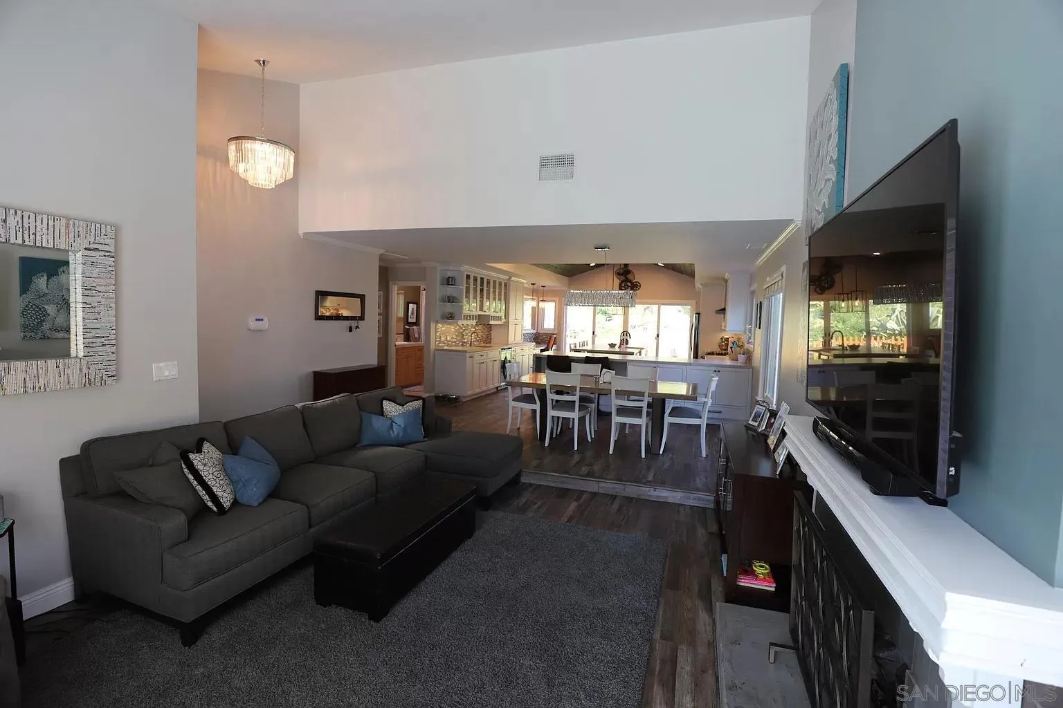 2132 Pleasant Grove Road Encinitas, CA 92024 - Photo 4 of 21 a living room with furniture and a flat screen tv