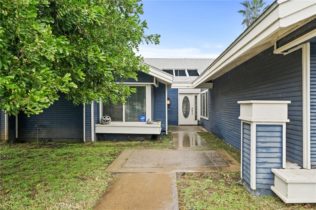 5810 Greens Drive Riverside, CA 92509 - Photo 2 of 31 a front view of a house with garden
