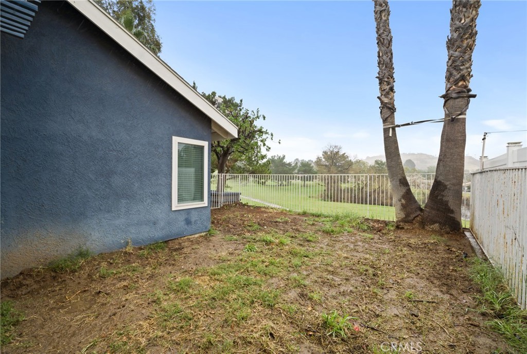 5810 Greens Drive Riverside, CA 92509 - Photo 27 of 31 a view of a yard with a lake view
