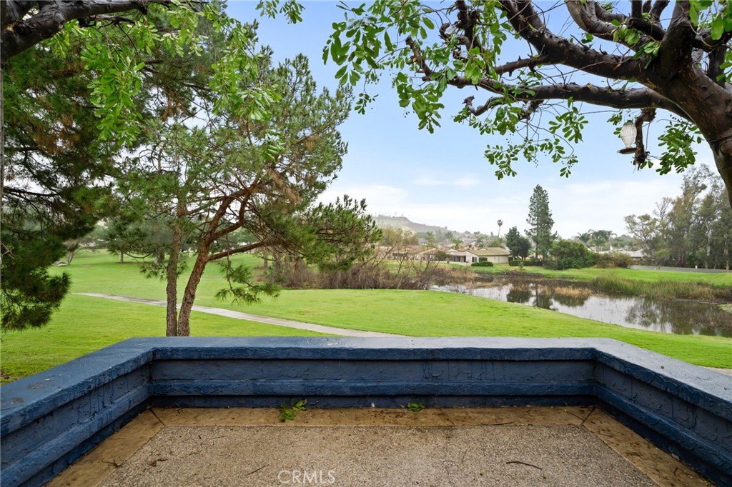 5810 Greens Drive Riverside, CA 92509 - Photo 30 of 31 a yard with wooden fence and lake view