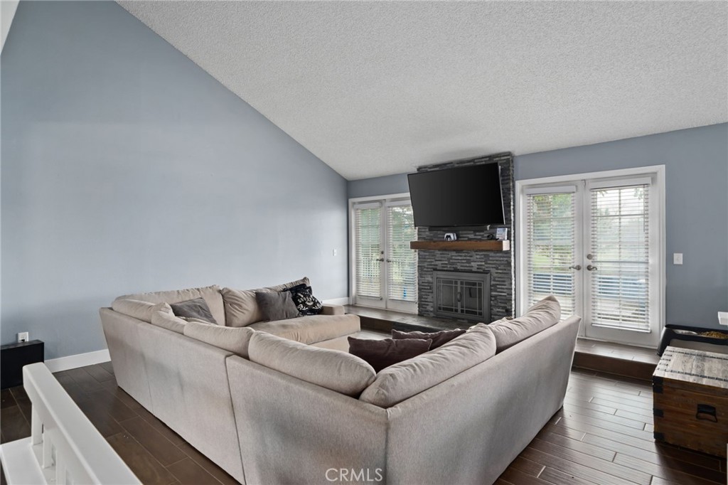 5810 Greens Drive Riverside, CA 92509 - Photo 5 of 31 a living room with furniture and a flat screen tv
