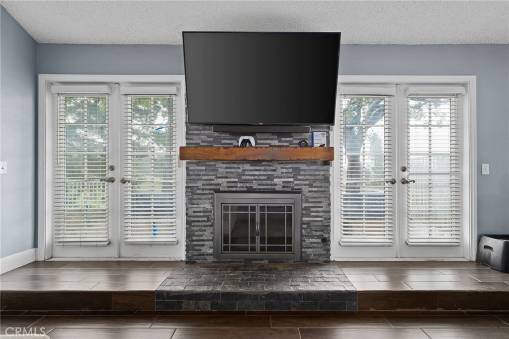 5810 Greens Drive Riverside, CA 92509 - Photo 7 of 31 a living room with furniture and a fireplace