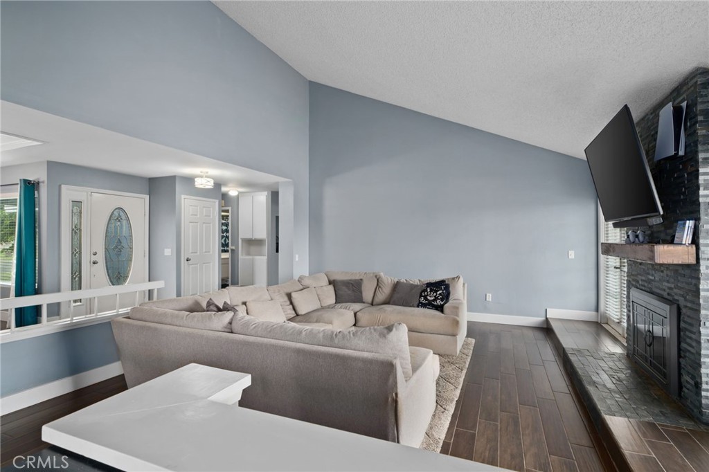 5810 Greens Drive Riverside, CA 92509 - Photo 8 of 31 a living room with furniture and a flat screen tv