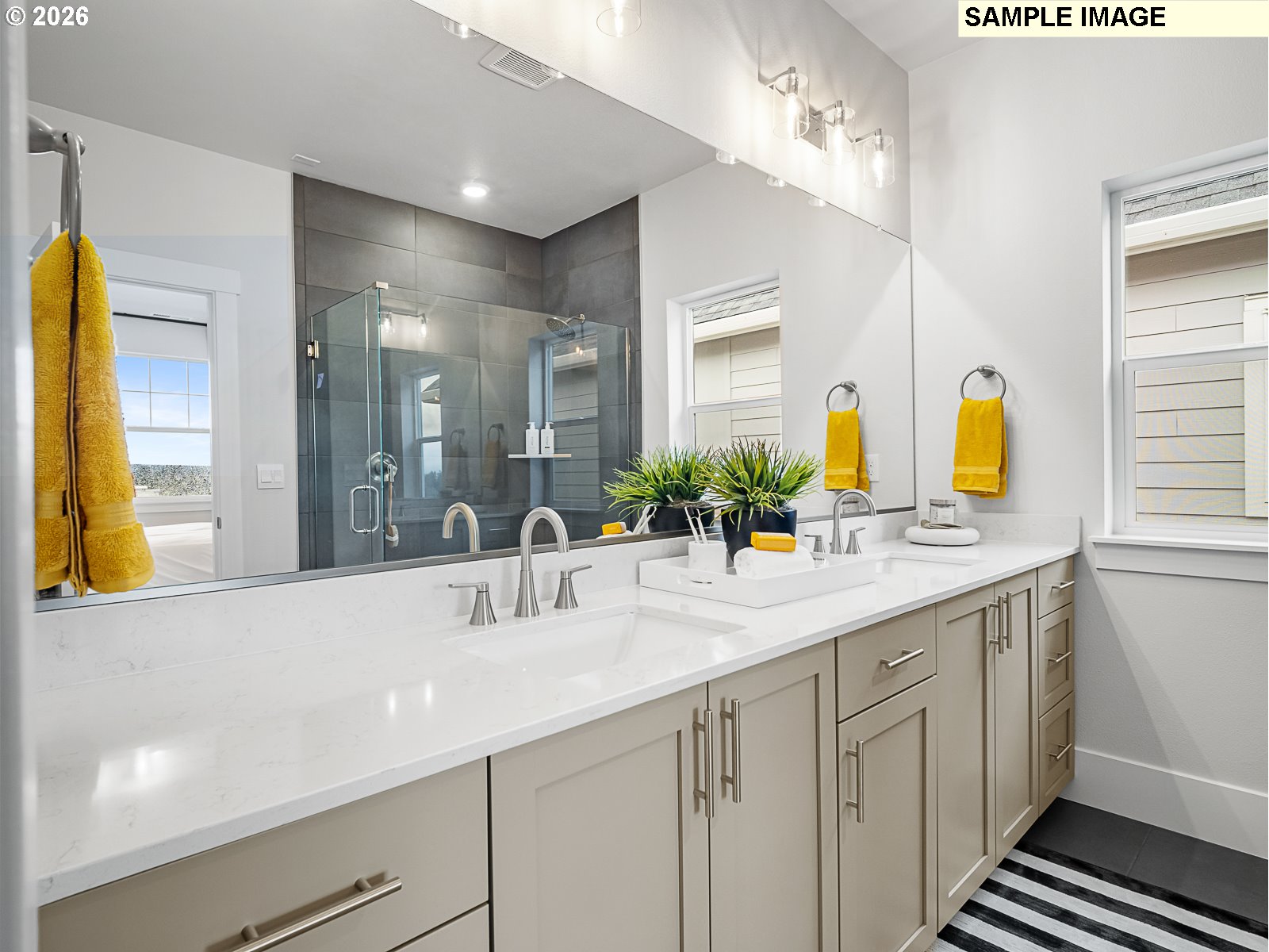 16853 Southwest Pomelo Drive Sherwood, OR 97140 - Photo 11 of 37 a bathroom with a double vanity sink and a mirror