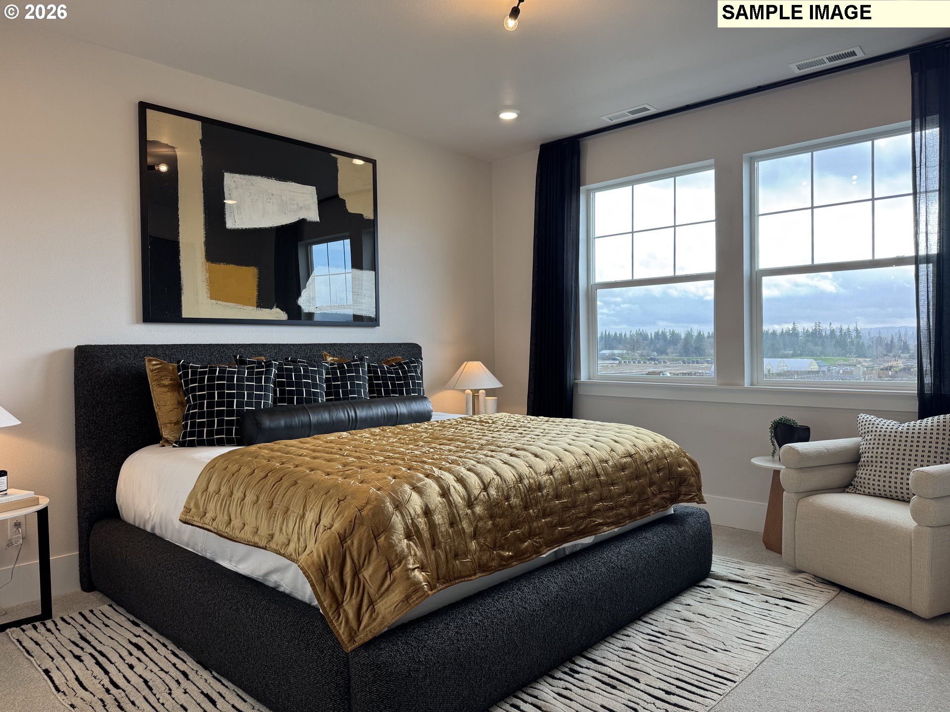 16853 Southwest Pomelo Drive Sherwood, OR 97140 - Photo 13 of 37 a bedroom with a bed couch and window