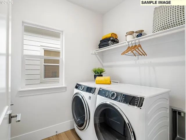 a utility room with dryer and washer
