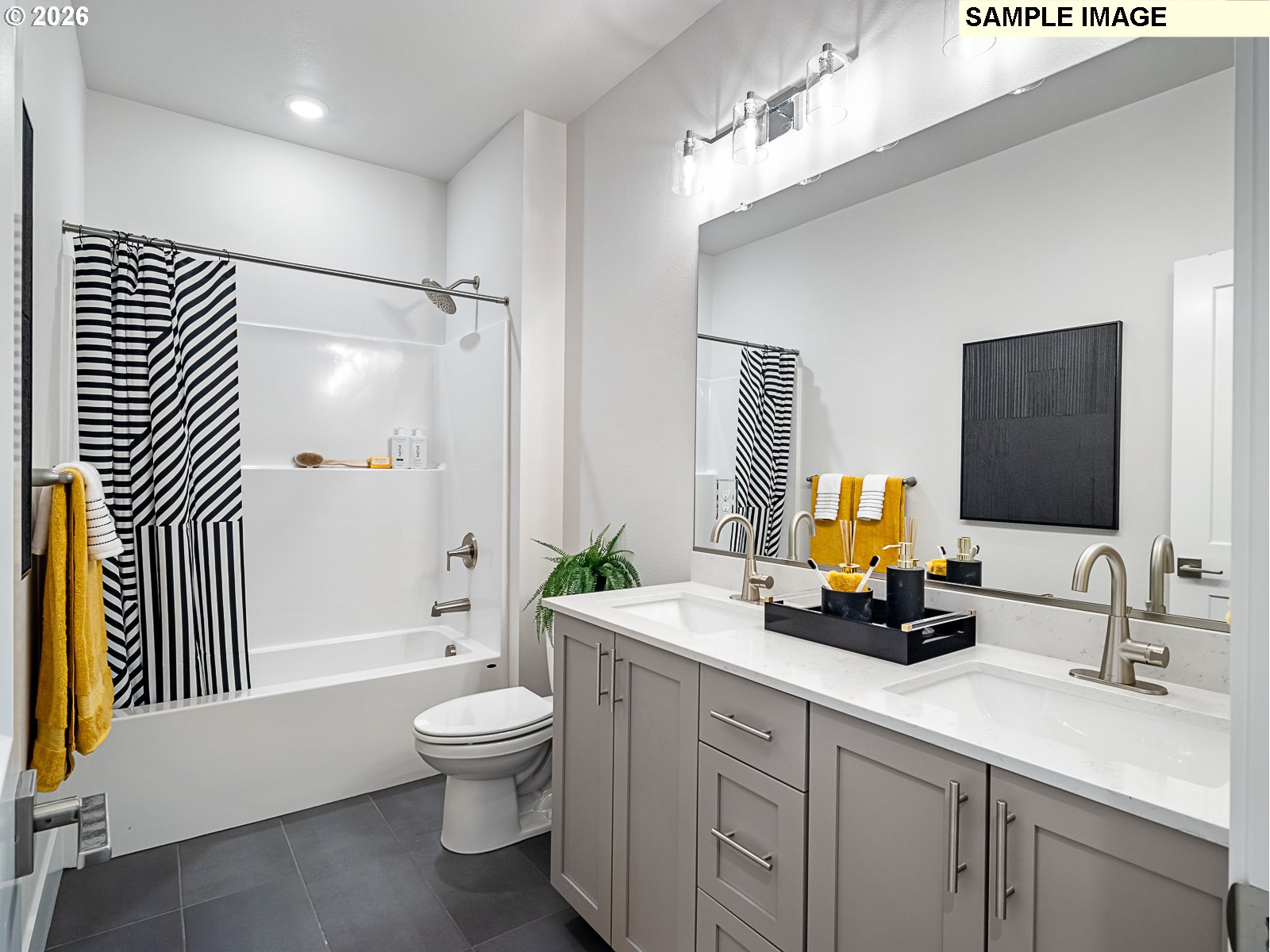 16853 Southwest Pomelo Drive Sherwood, OR 97140 - Photo 19 of 37 a bathroom with a toilet a sink and a bathtub
