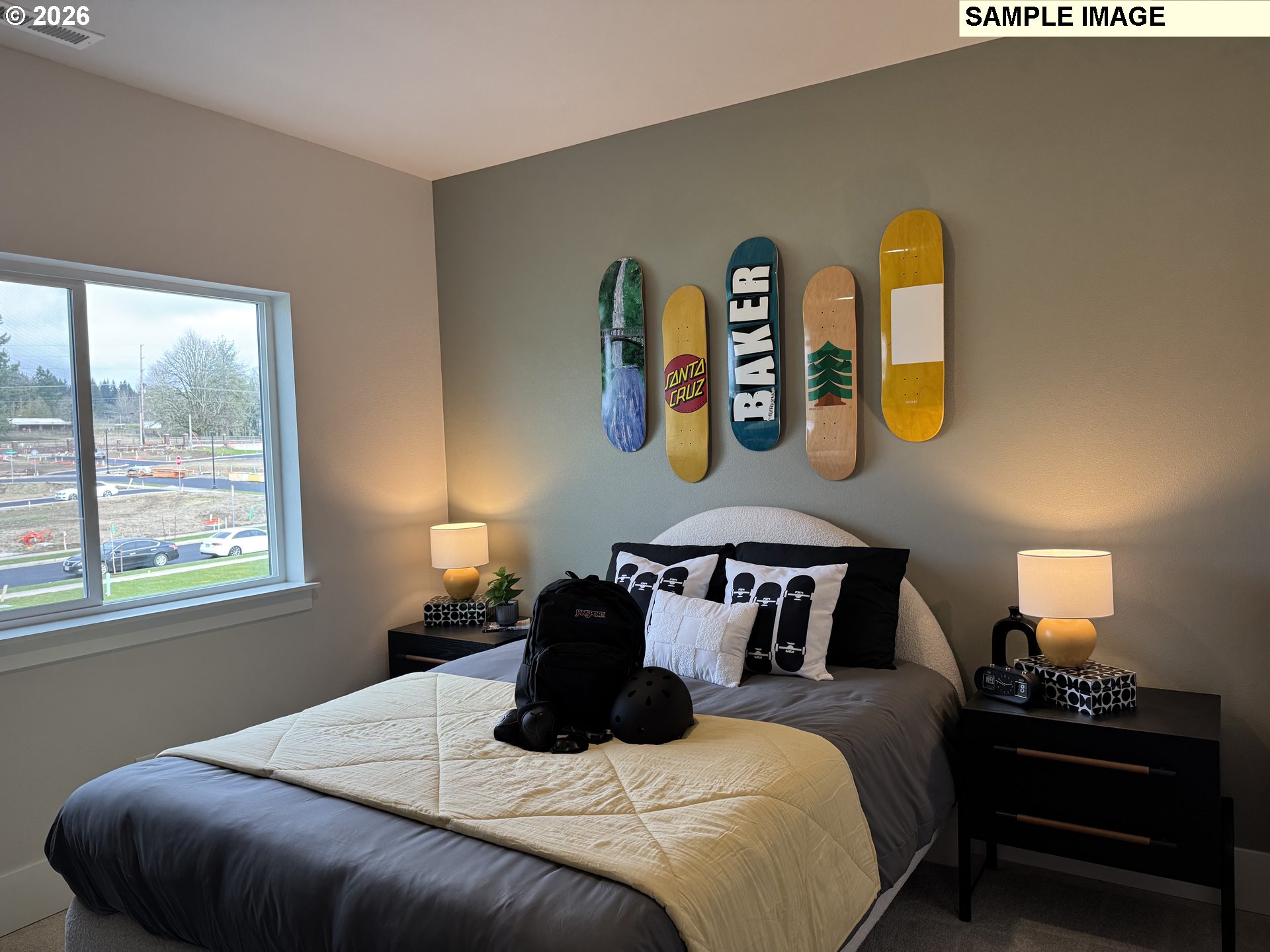 16853 Southwest Pomelo Drive Sherwood, OR 97140 - Photo 22 of 37 a bedroom with a bed and painting on the wall