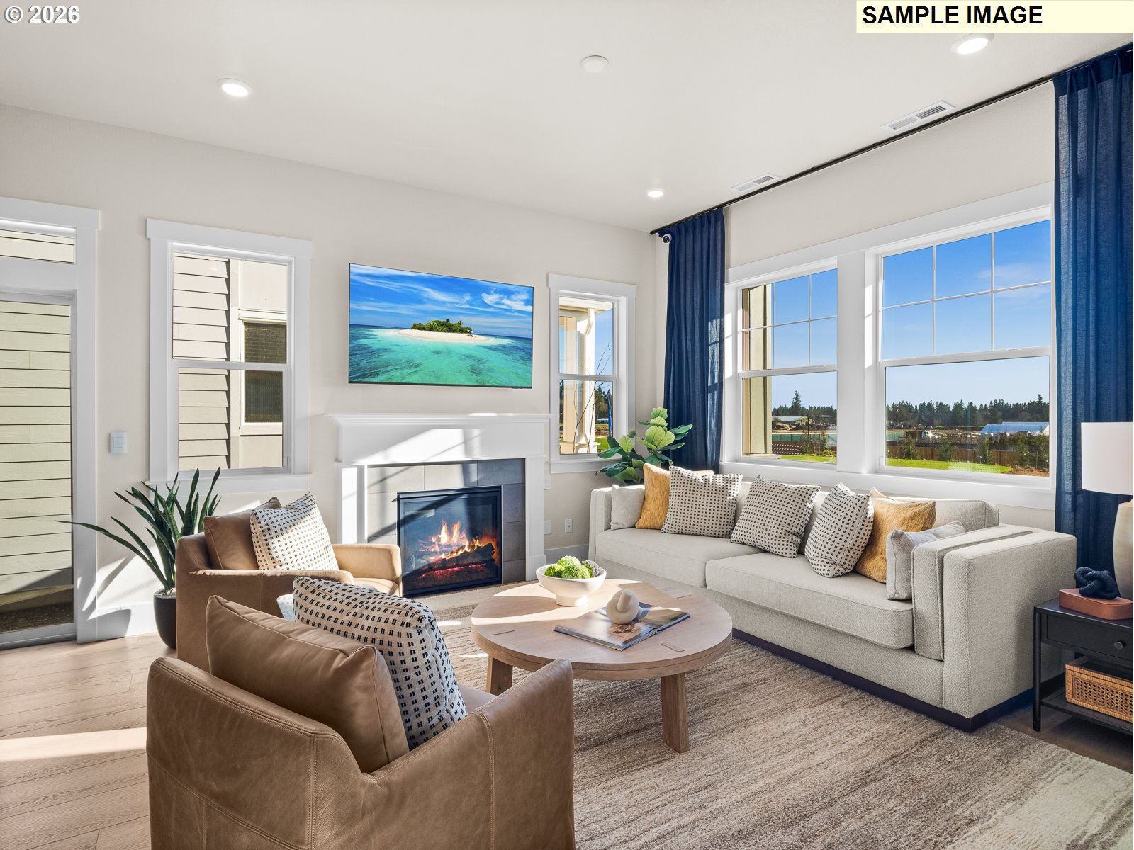 16853 Southwest Pomelo Drive Sherwood, OR 97140 - Photo 36 of 37 a living room with furniture fireplace and a large window