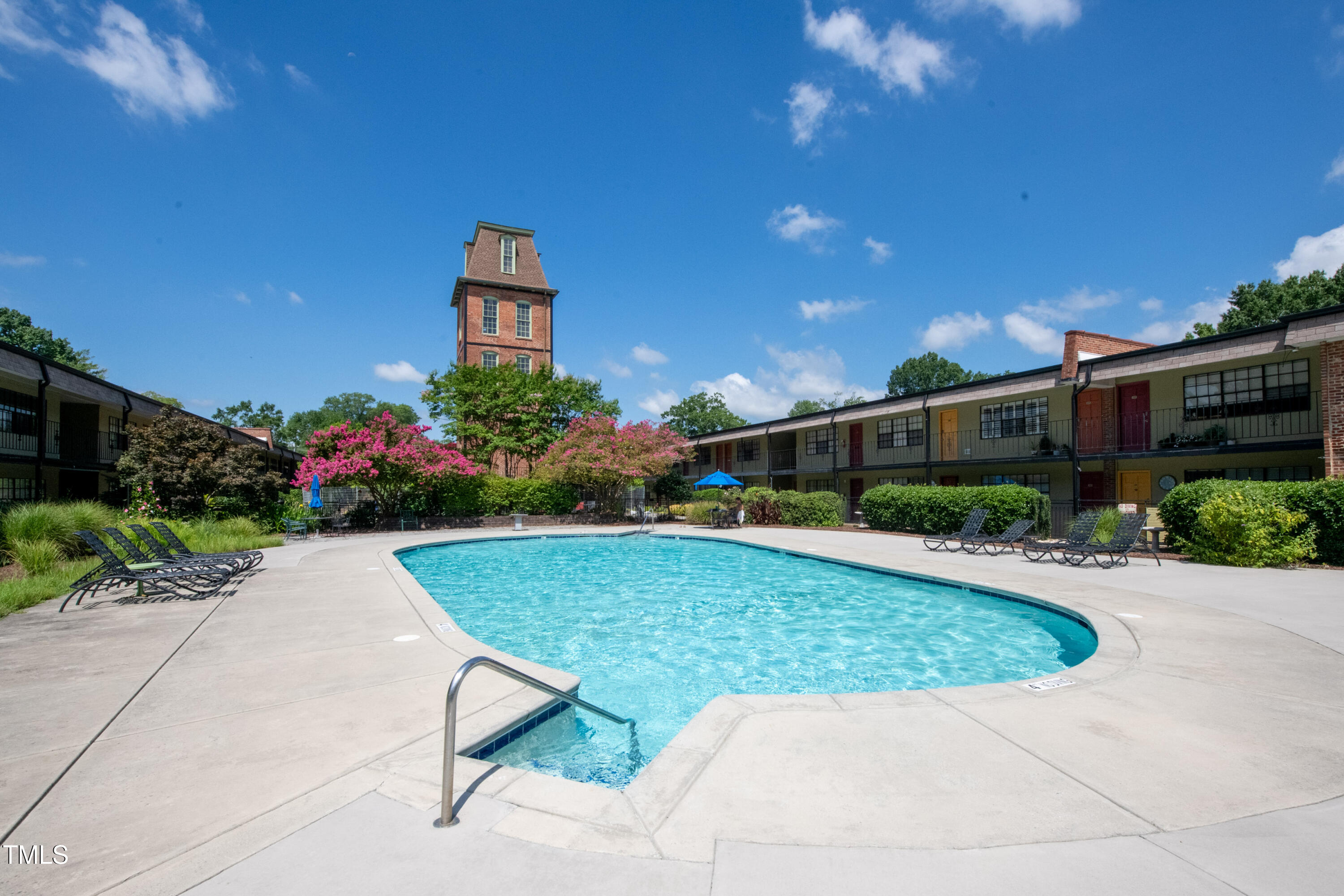807 West Trinity Avenue, Unit 232 Durham, NC 27701 - Photo 19 of 26 a front view of a house with garden