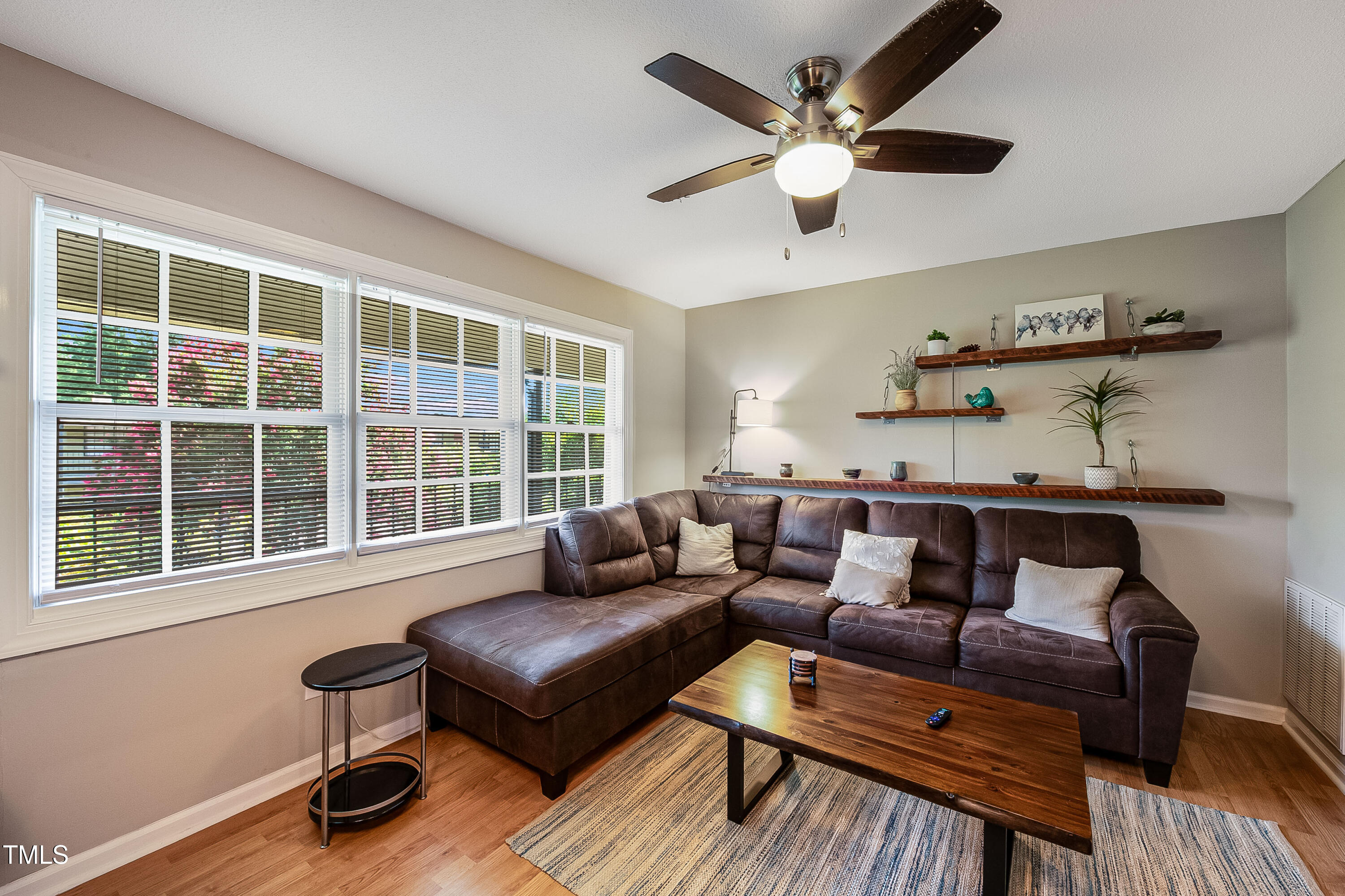 807 West Trinity Avenue, Unit 232 Durham, NC 27701 - Photo 4 of 26 a living room with furniture and a window