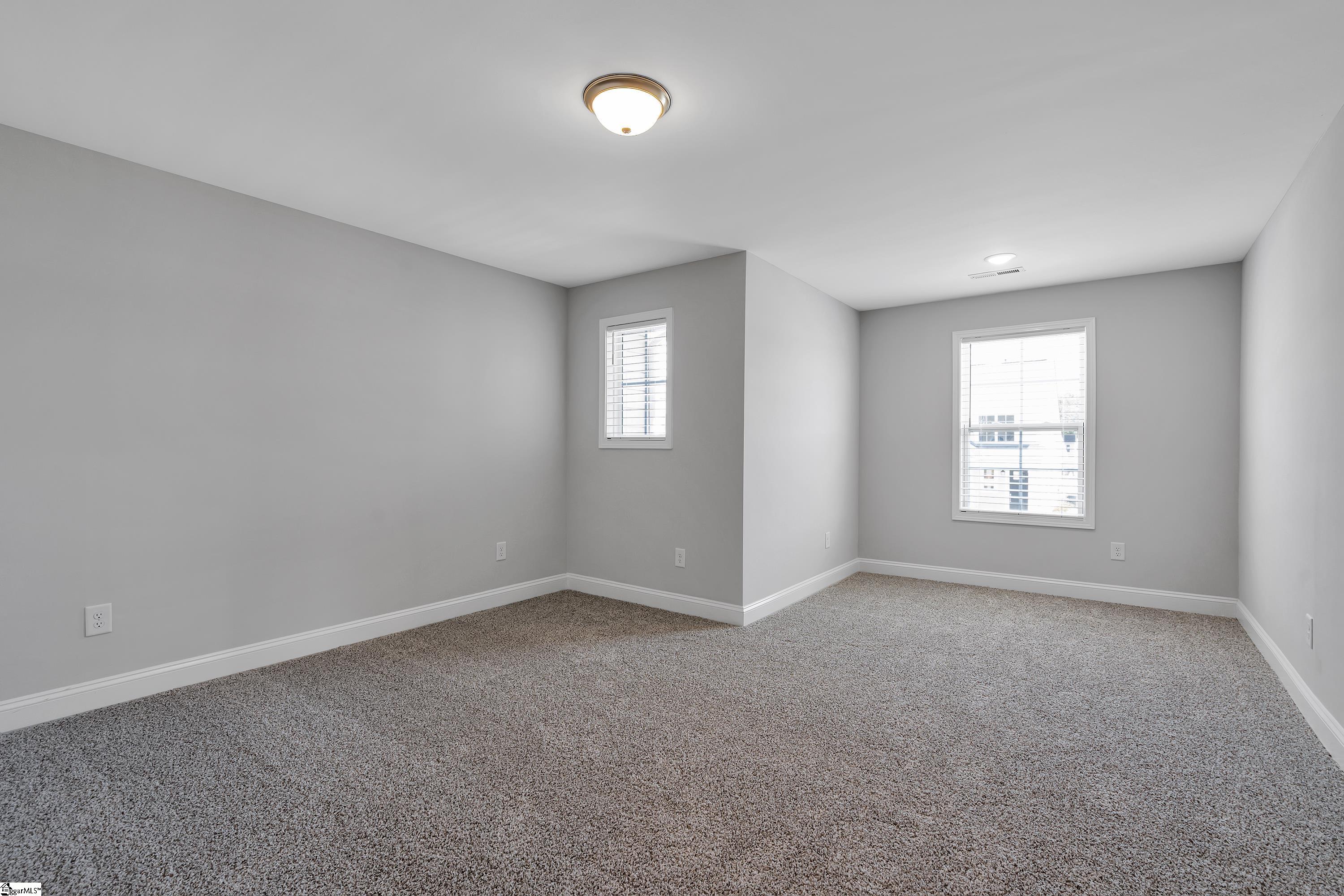 5 Red Lion Road Greenville, SC 29607 - Photo 18 of 33 Large guest bedroom with sitting area