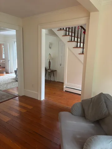 a view of a livingroom from a hallway
