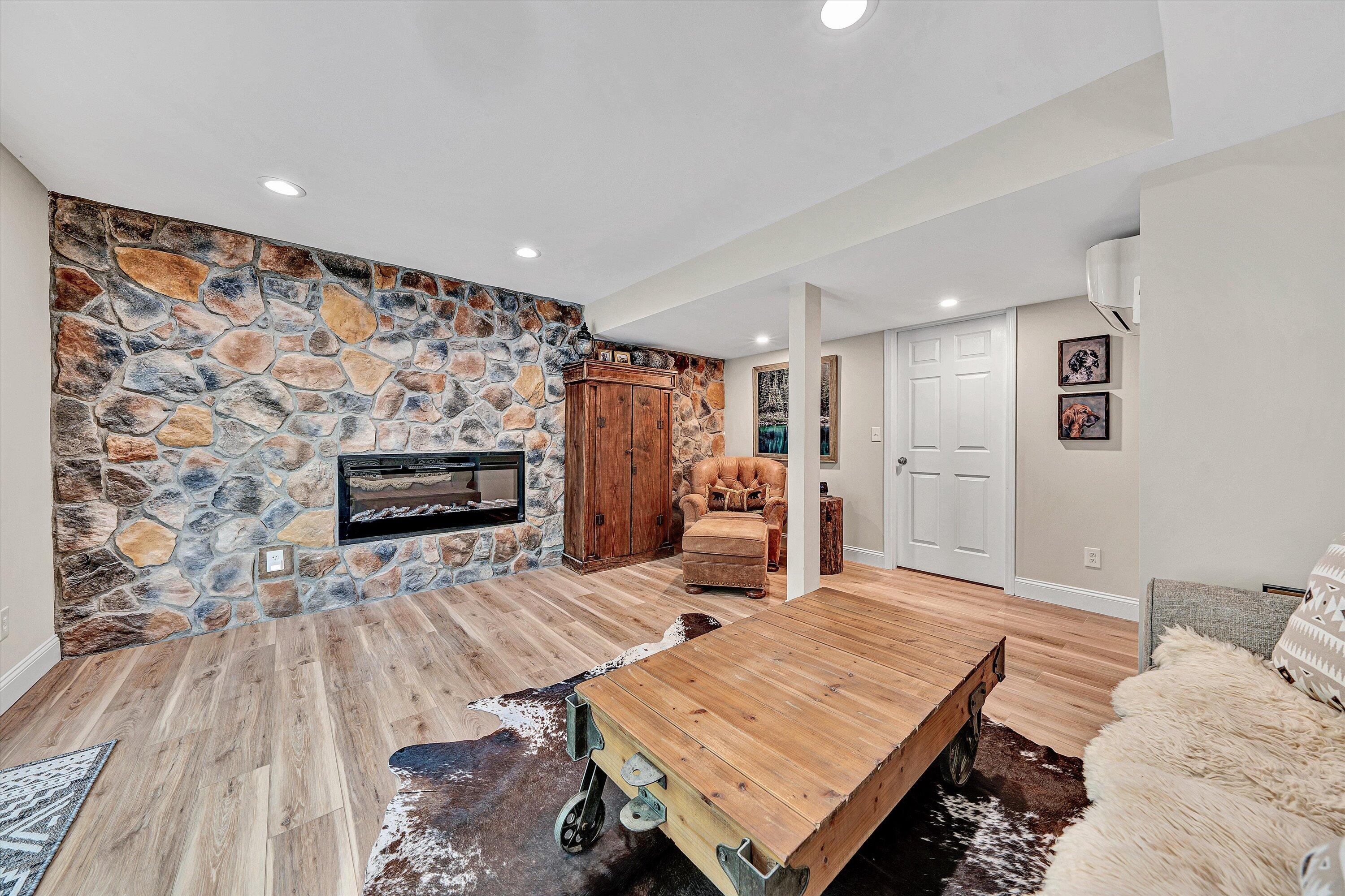 6211 Hillcrest Road Salem, VA 24153 - Photo 23 of 36 a living room with furniture and a fireplace