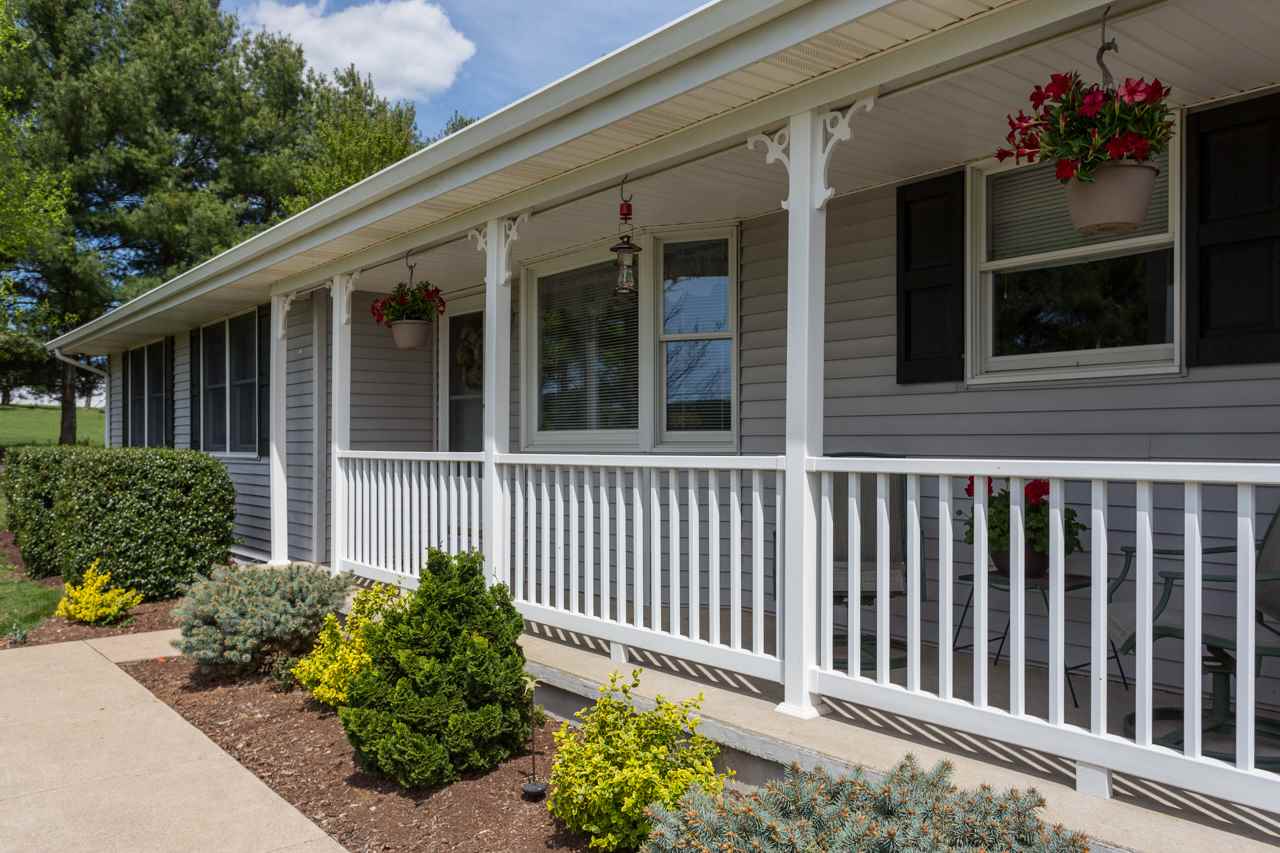 695 Brower Road Waynesboro, VA 22980 - Photo 4 of 50 a view of a house with a flower garden