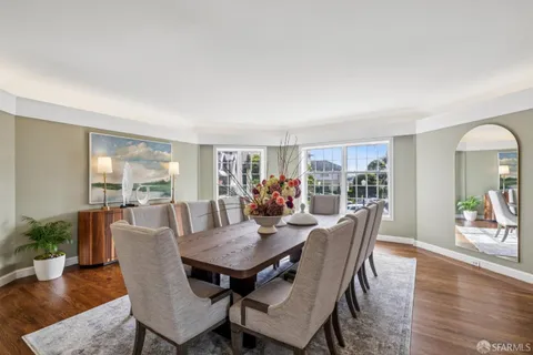 a bathroom with a sink toilet and mirror