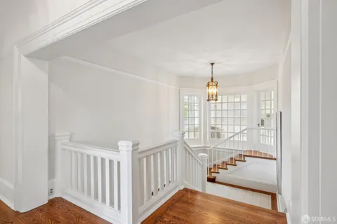 a bedroom with furniture and a couch