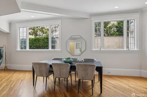 a kitchen with granite countertop a stove and a window