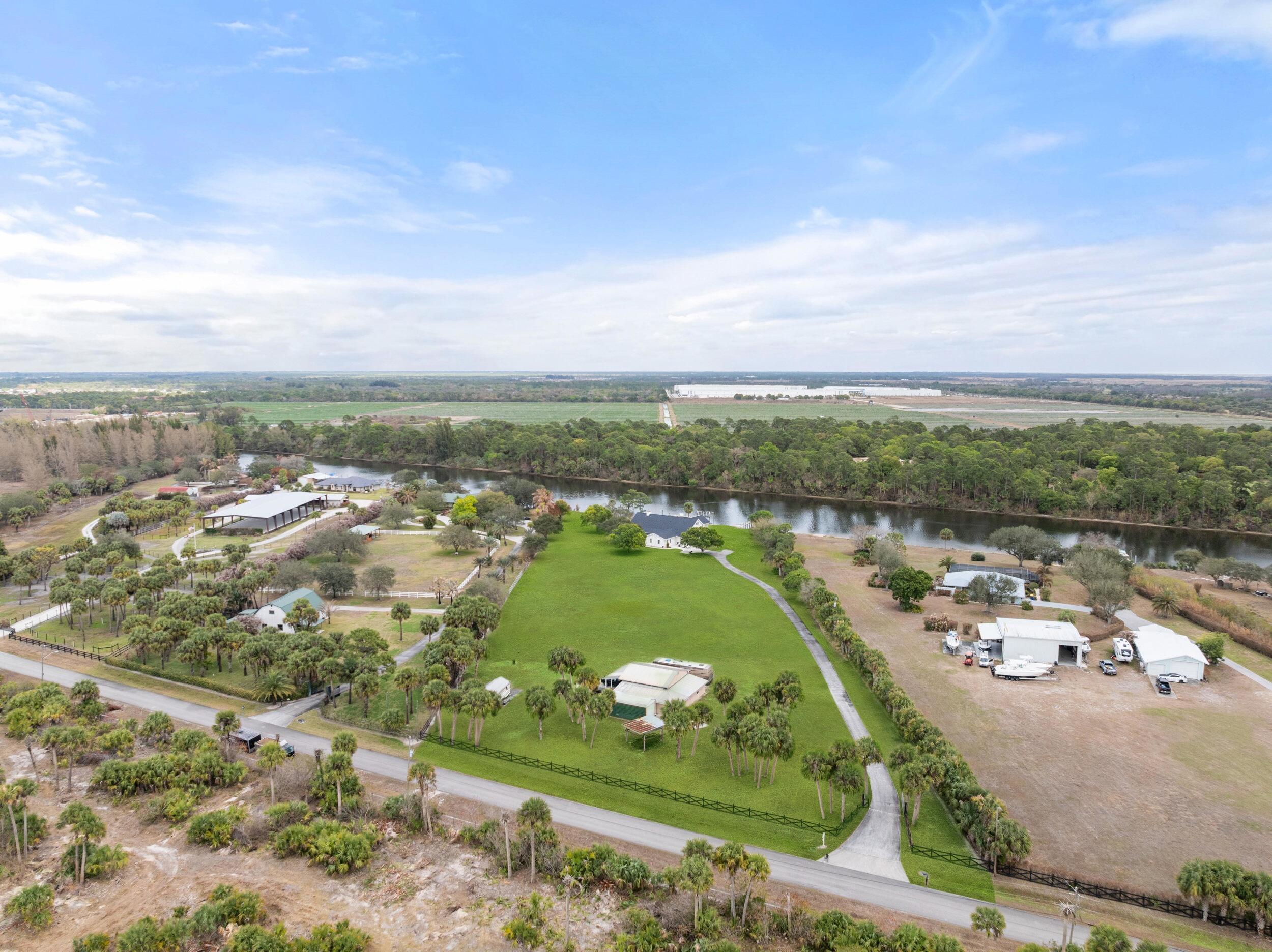 10125 Southwest Green Ridge Lane, Unit LANE Palm City, FL 34990 - Photo 80 of 84 62_dji_20260227035820_0119_d