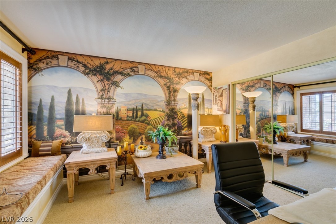 9325 West Desert Inn Road, Unit 244 Las Vegas, NV 89117 - Photo 26 of 55 Imagine yourself immersed in a serene Tuscan landscape within this distinctively designed study.