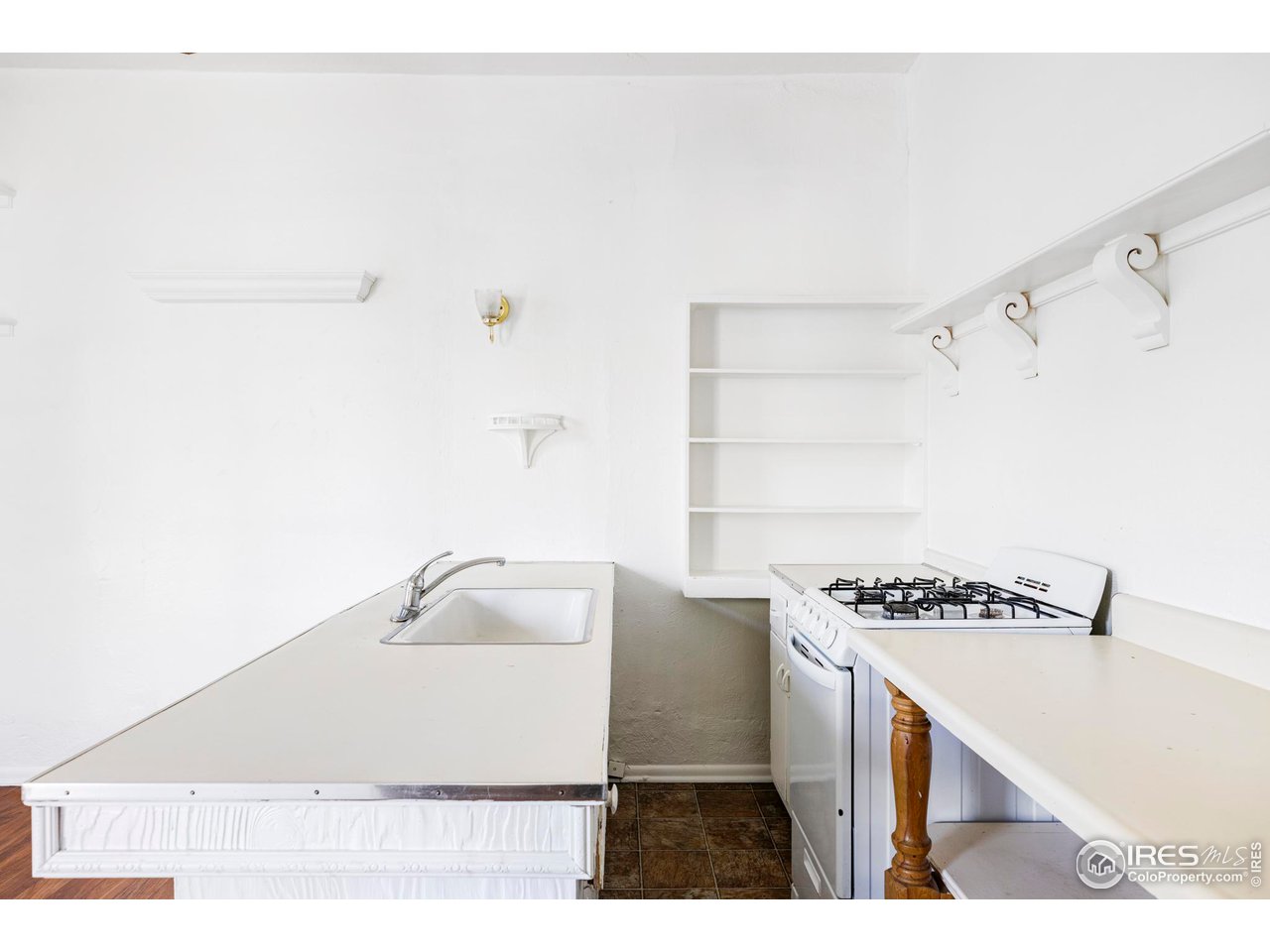 1843 Grove Street Boulder, CO 80302 - Photo 10 of 16 a utility room with cabinets washer and dryer