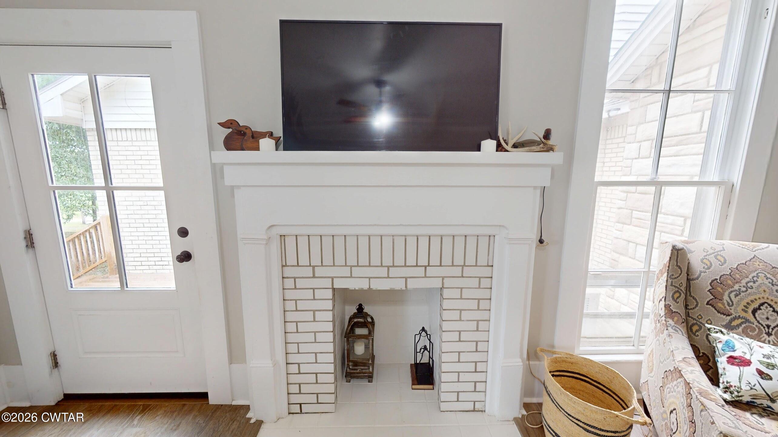 2800 Locust Grove Road Newbern, TN 38059 - Photo 11 of 46 a living room with furniture and a flat screen tv