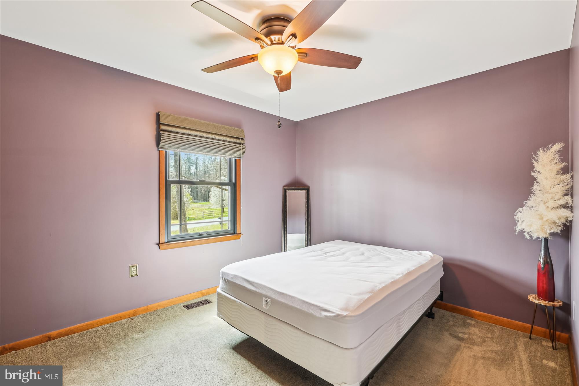 16130 Inheritance Drive Brandywine, MD 20613 - Photo 15 of 39 a bedroom with a bed and a chandelier