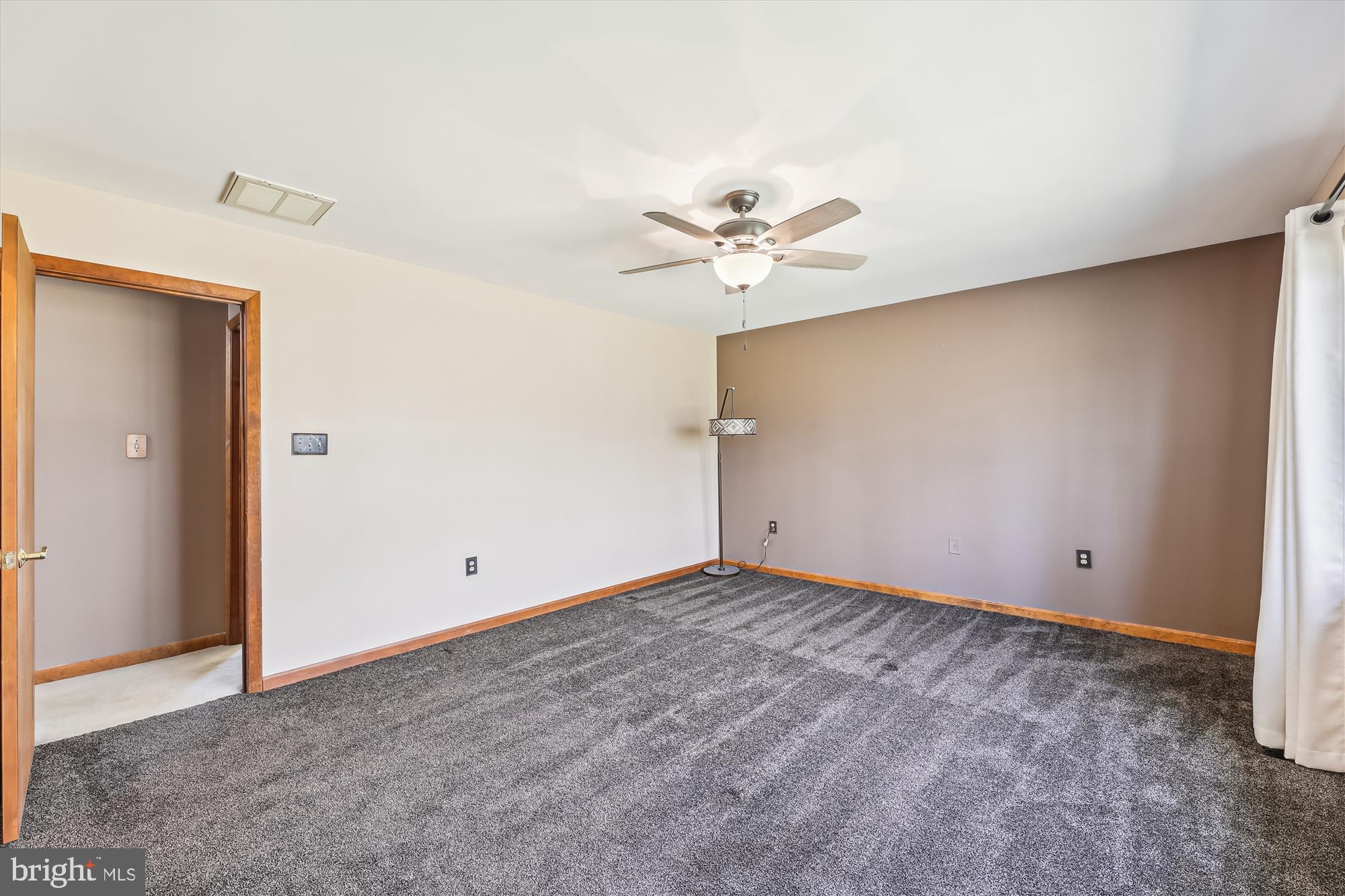16130 Inheritance Drive Brandywine, MD 20613 - Photo 22 of 39 an empty room with a empty space and a ceiling fan