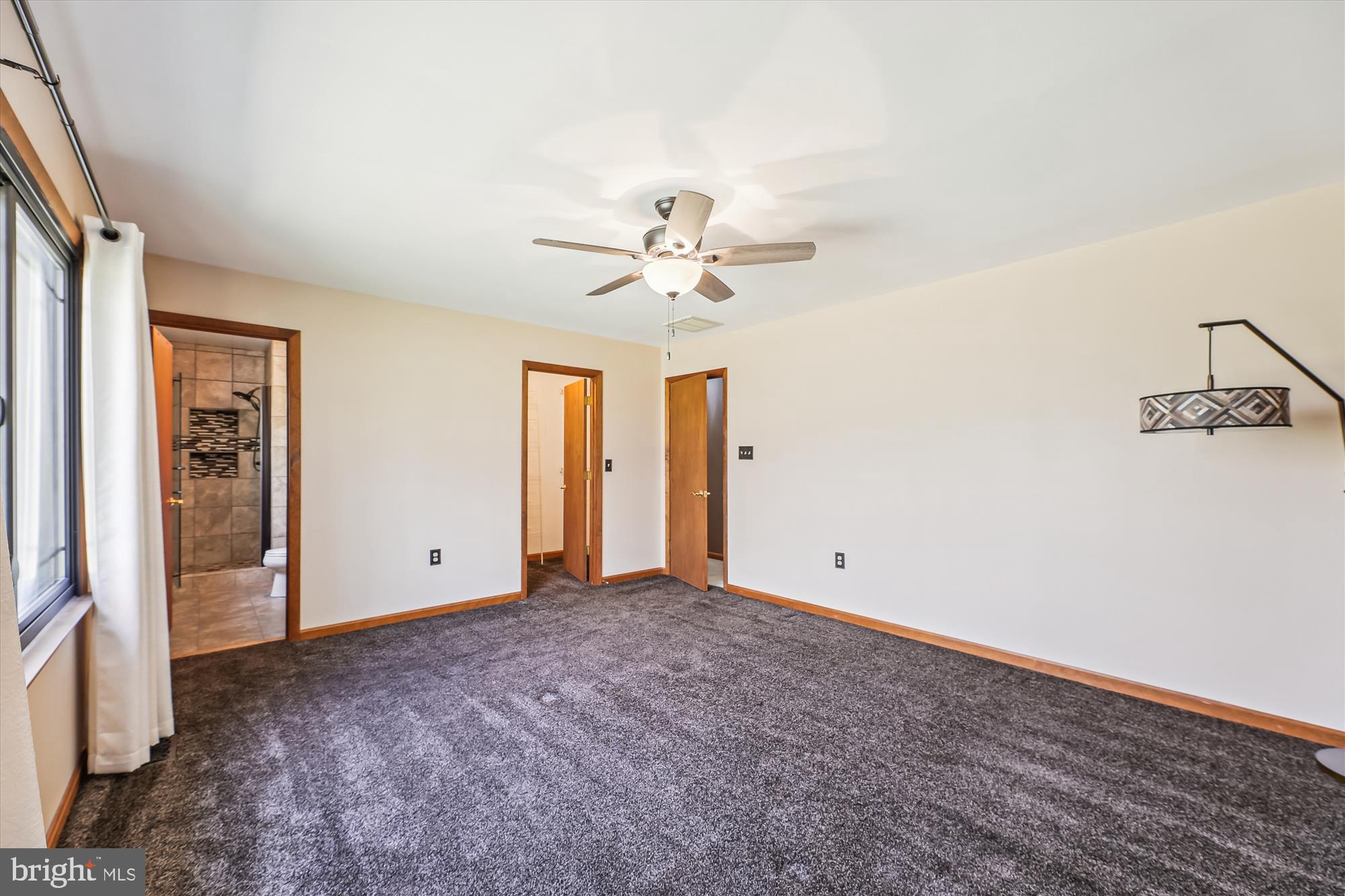 16130 Inheritance Drive Brandywine, MD 20613 - Photo 24 of 39 a view of an empty room with a ceiling fan
